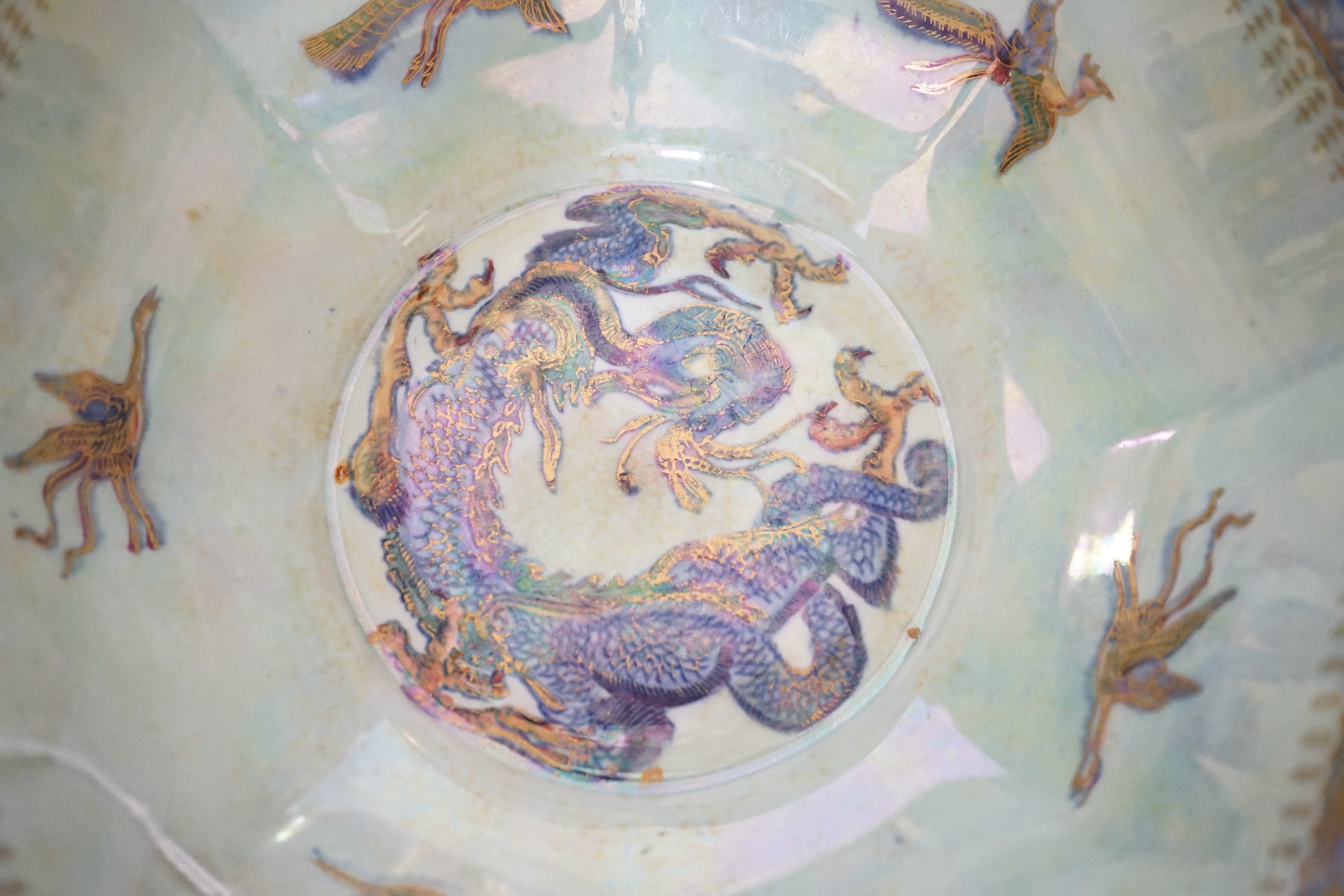 A Wedgwood ‘dragon’ lustre bowl of octagonal form, design number Z4831, decorated centrally with a dragon, 10cm